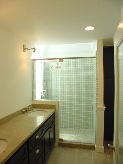 Master Bathroom - Features glass tiled large shower, with skylight above.