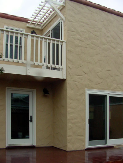 Rear Elevation - Master suite deck above kitchen door.
