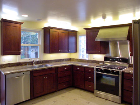 Kitchen - A small raised shelf at rear of counters helps keep counters clear.