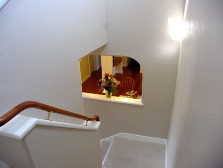 Stairwell - View back to dining area below. 